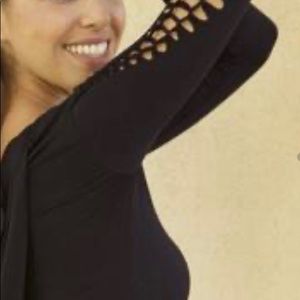 NEW BLACK SEXY LONG SLEEVE  TOP SIZE MED.